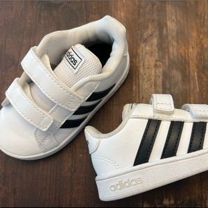 Adidas, black and white. Size 6c, worn only once.